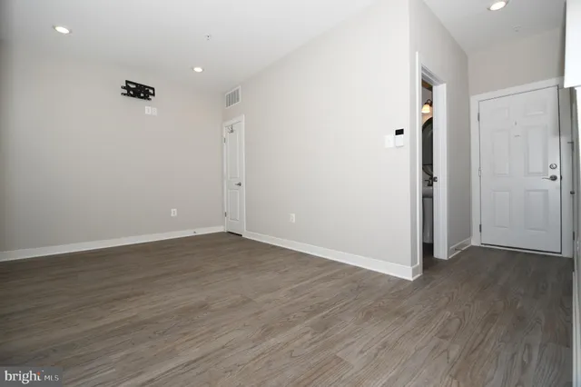 a view of a hallway view with staircase