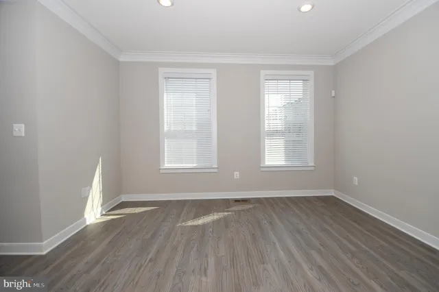a view of wooden deck and city view