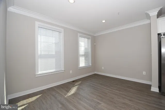 a view of a balcony with wooden floor