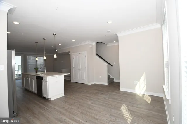 a view of a balcony with wooden floor