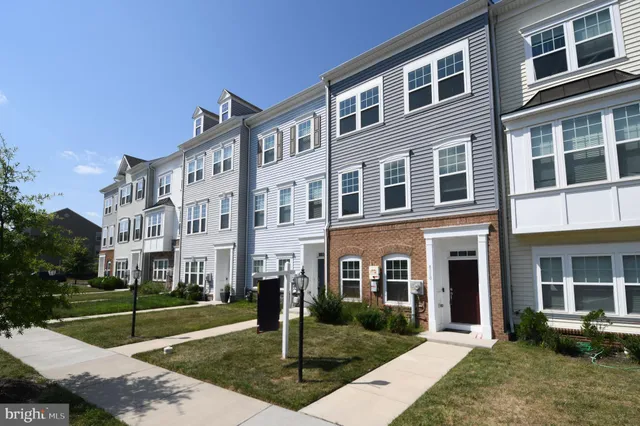 a front view of a building with garden