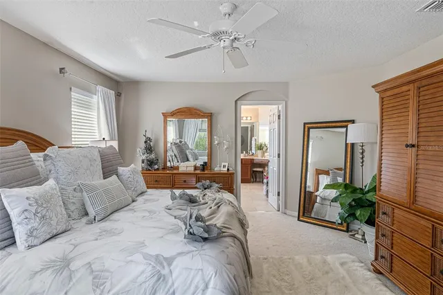 a large spacious bathroom with a large tub and sink