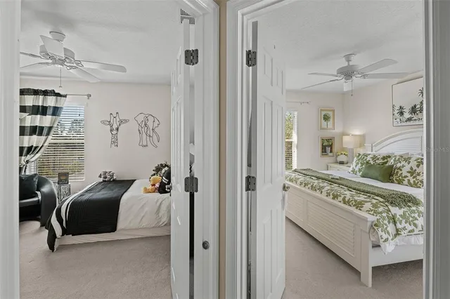 a bed room with a bed and a mirror