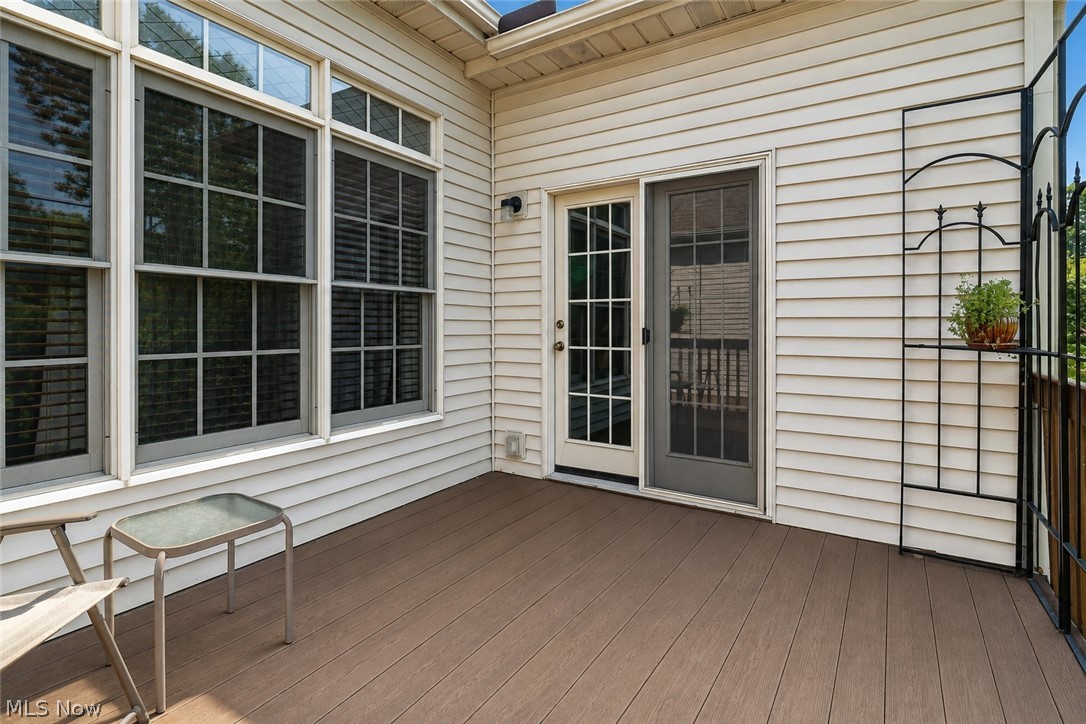 2601 Charing Cross Road Northwest Canton, OH 44708 - Photo 42 of 49 Exterior deck with composite flooring, white siding, and multi-pane windows