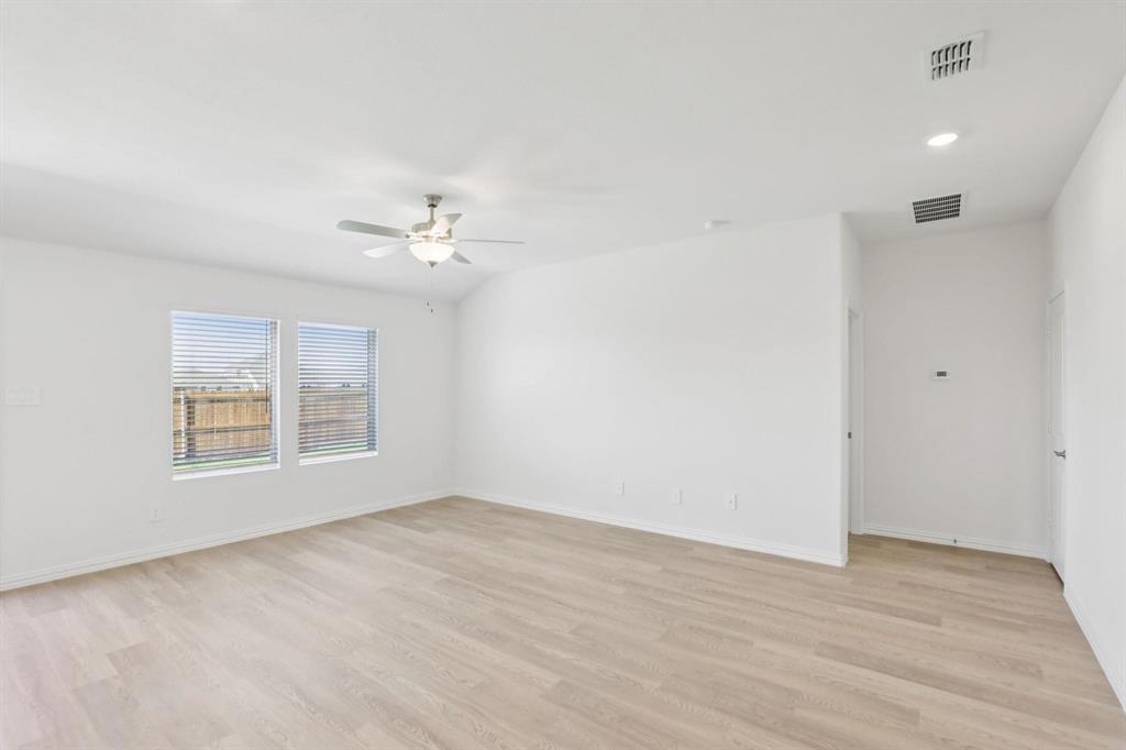 2100 Rannoch Street Sherman, TX 75092 - Photo 5 of 11 a view of an empty room with a window
