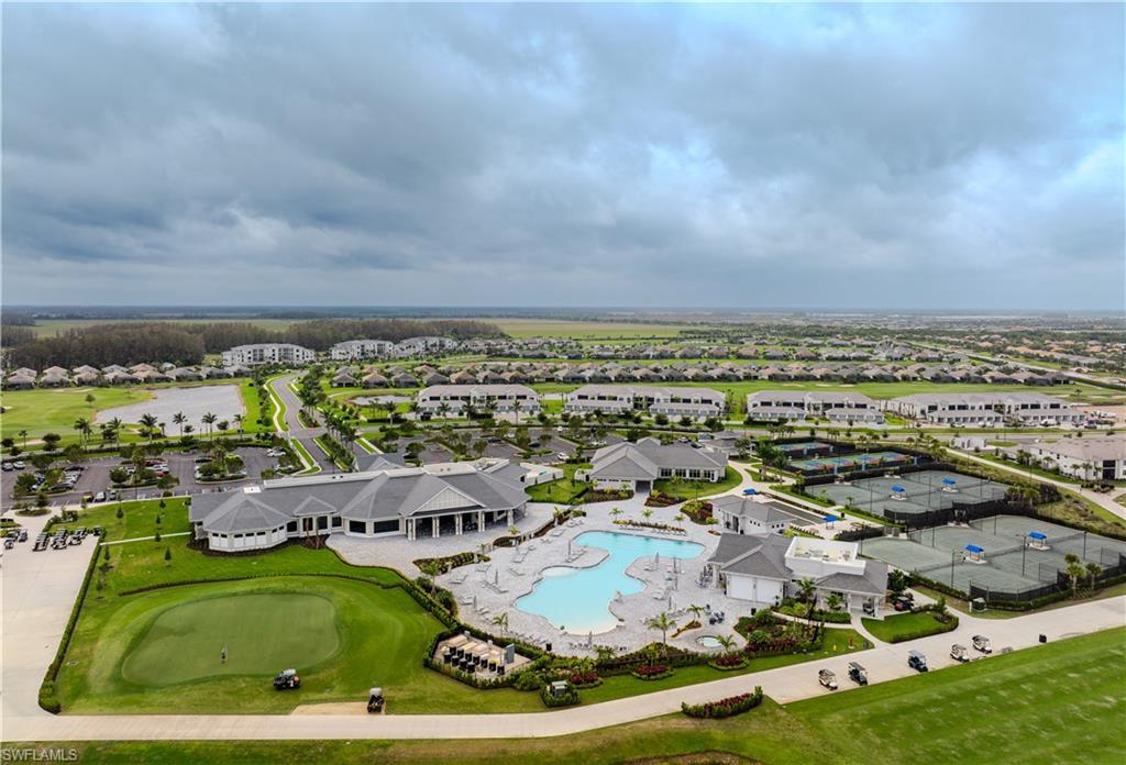 5583 Double Eagle Circle, Unit 4115 Ave Maria, FL 34142 - Photo 44 of 50 Aerial view featuring golf course view and a residential view