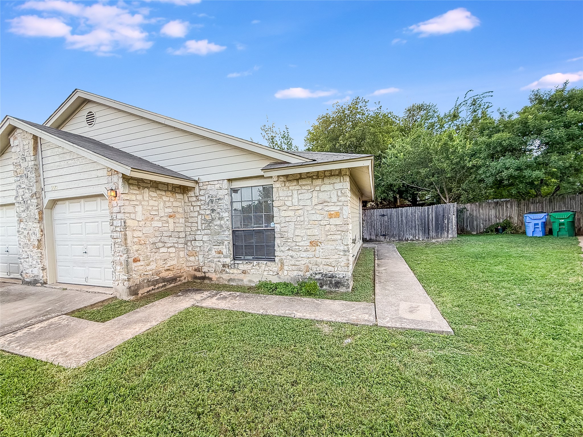 2014 Alex Avenue, Unit B Austin, TX 78728 - Photo 19 of 24 Side of the Home Leading to the Backyard