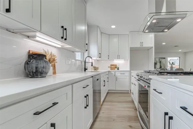 a view of a dining room with furniture