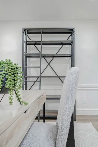 a kitchen with stainless steel appliances granite countertop a sink and a refrigerator
