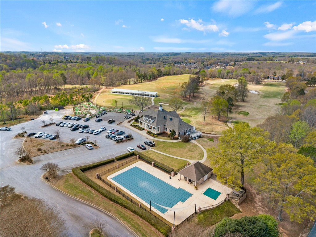 140 Turnberry Road Anderson, SC 29621 - Photo 42 of 44 This aerial view showcases a vibrant community with recreational amenities and lush landscapes.