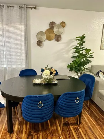 a kitchen with a sink cabinets and window