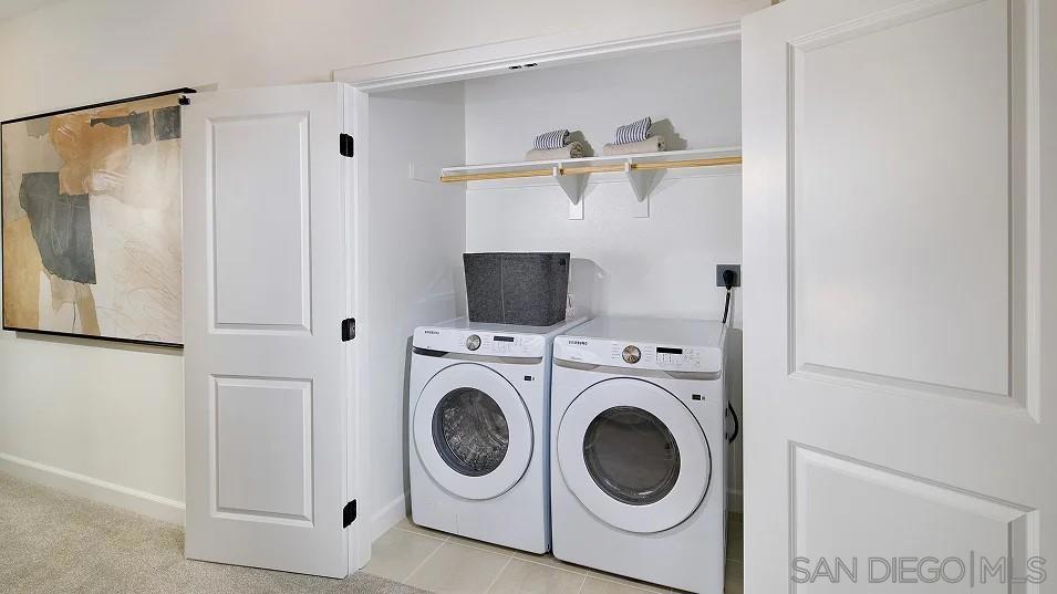 1057 Spike Street, Unit 2 Chula Vista, CA 91911 - Photo 13 of 18 a utility room with dryer and washer