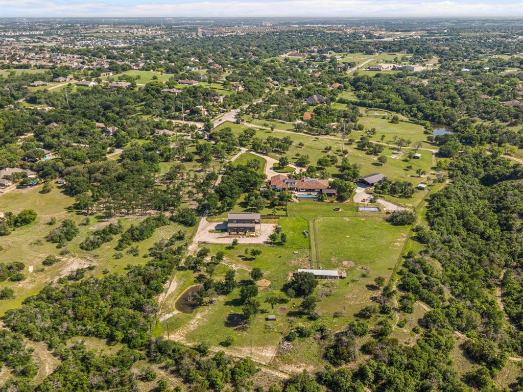 321 Verna Trail North Fort Worth, TX 76108 - Photo 37 of 40 an aerial view of residential houses with outdoor space