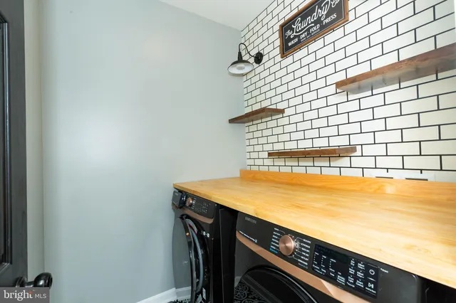 a bathroom with a sink and a shower