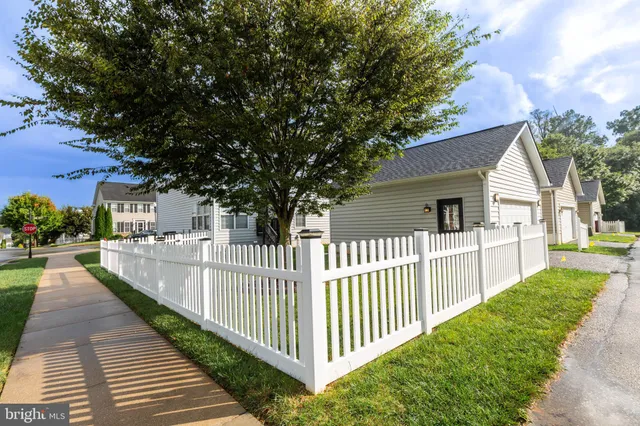 a view of a porch and garden