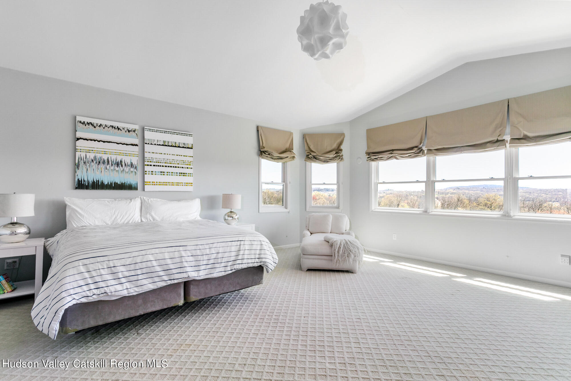 742 Embought Road Catskill, NY 12414 - Photo 12 of 30 a bedroom with a bed and a large window