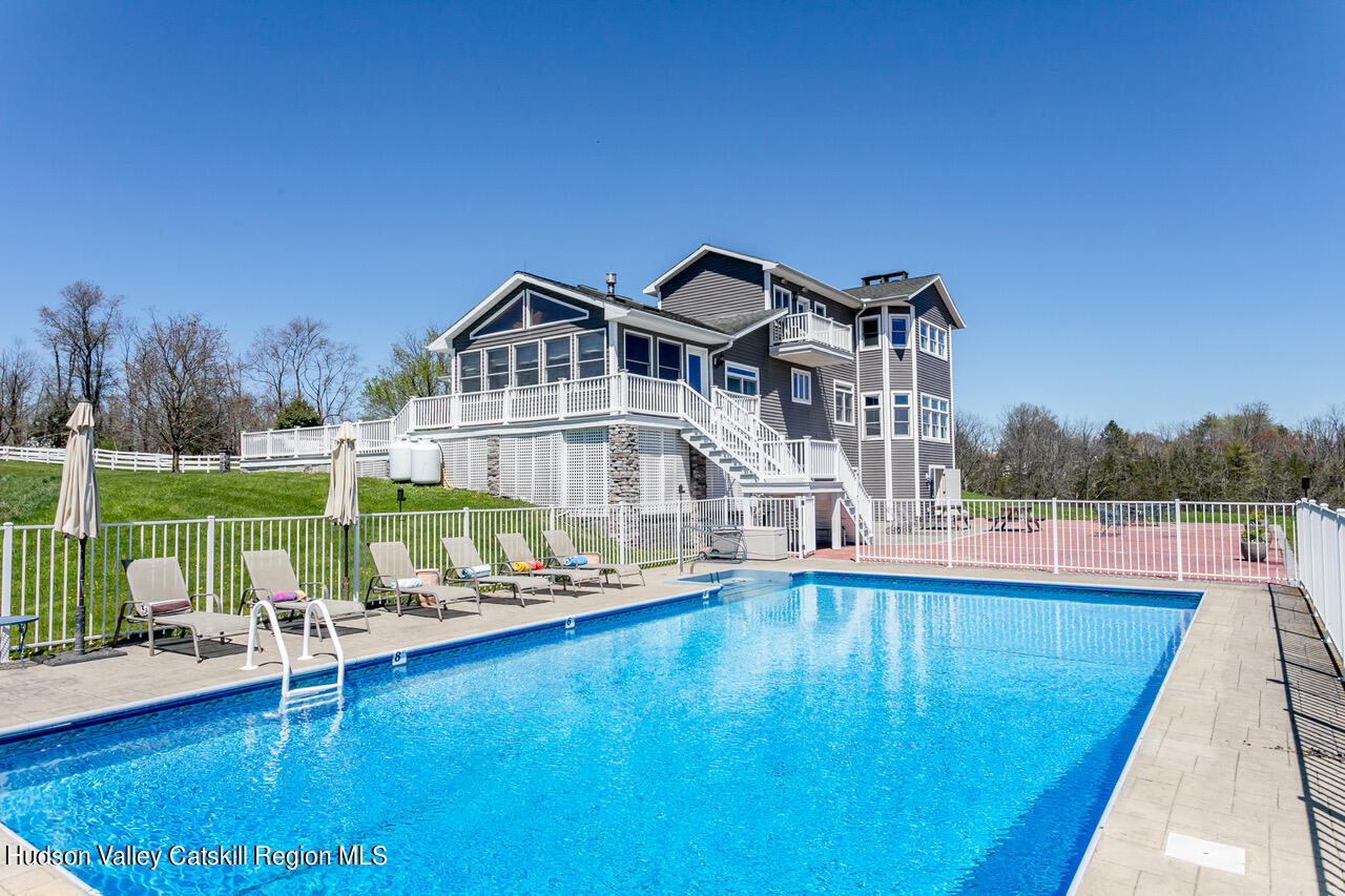 742 Embought Road Catskill, NY 12414 - Photo 2 of 30 a front view of a house with swimming pool having outdoor seating