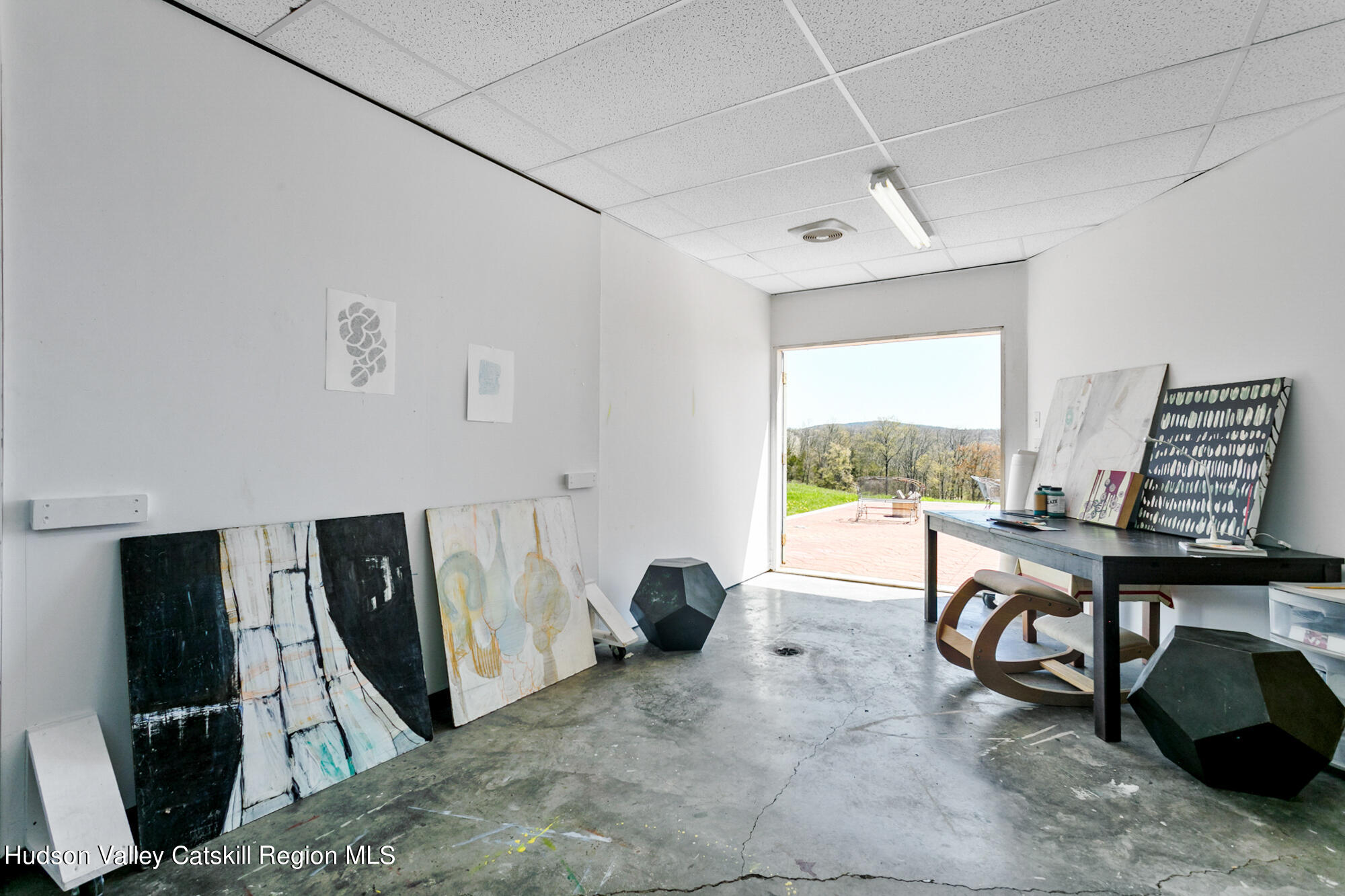 742 Embought Road Catskill, NY 12414 - Photo 22 of 30 a view of a workspace with furniture and a window