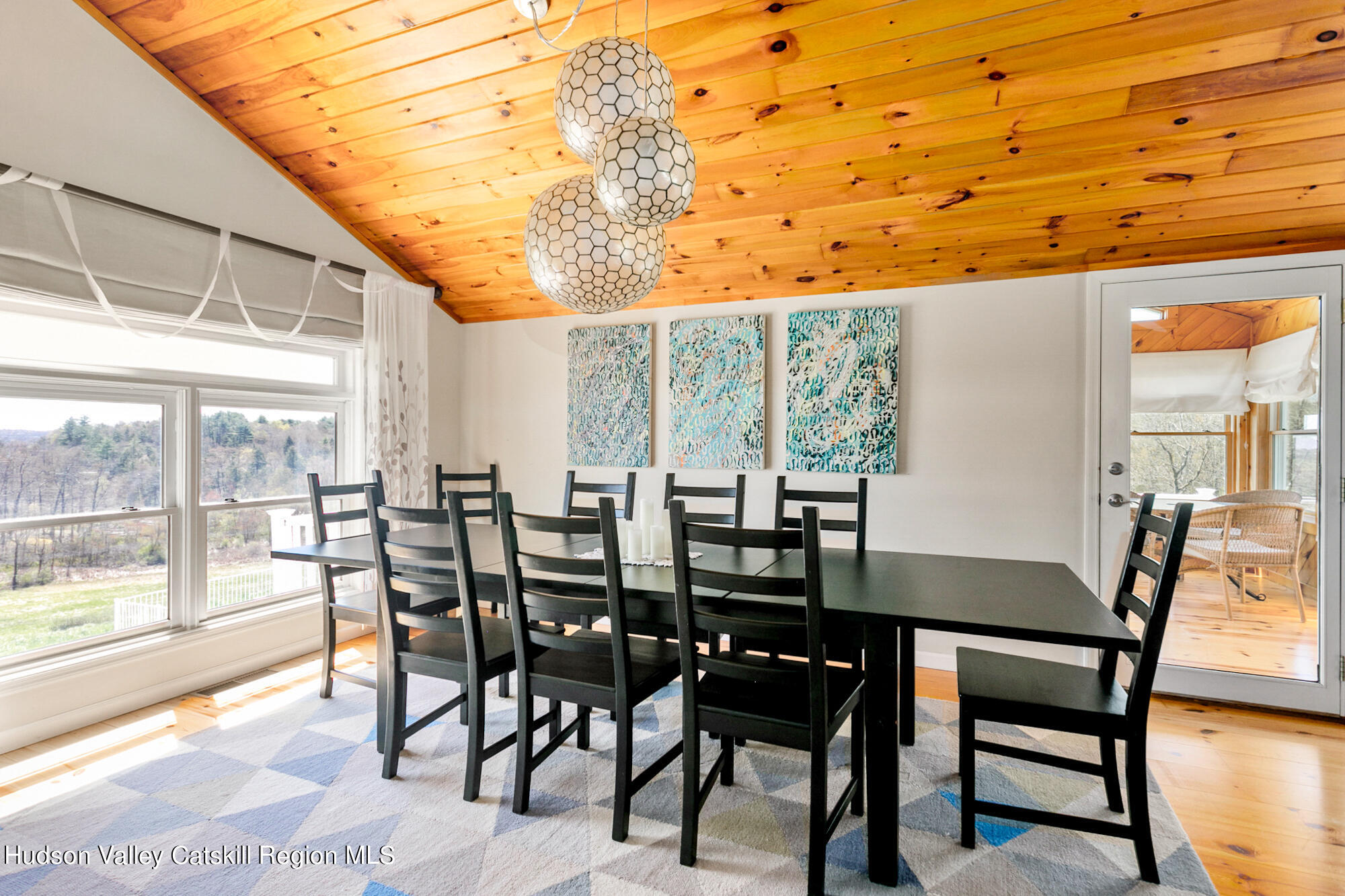 742 Embought Road Catskill, NY 12414 - Photo 8 of 30 a view of a dining room with furniture and wooden floor