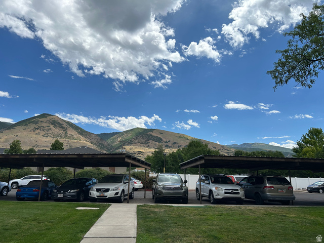 88 West 50 South, Unit C1 Centerville, UT 84014 - Photo 5 of 16 Covered parking structures with mountain backdrop