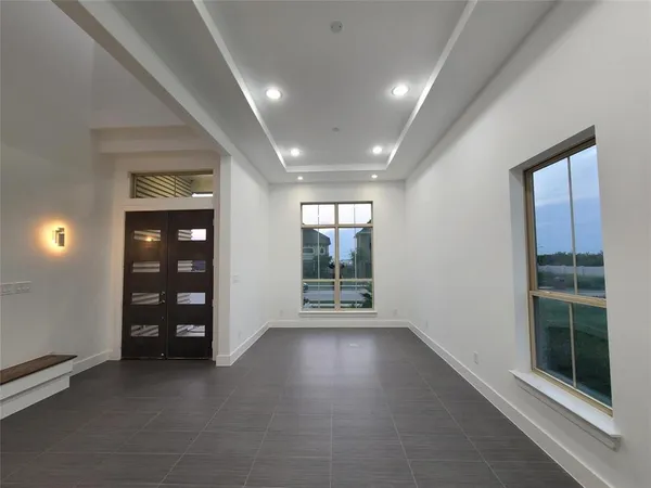 an empty room with windows