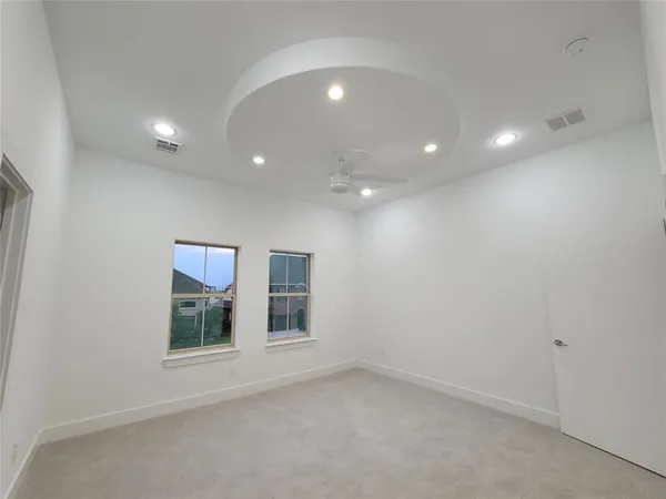 an empty room with fireplace