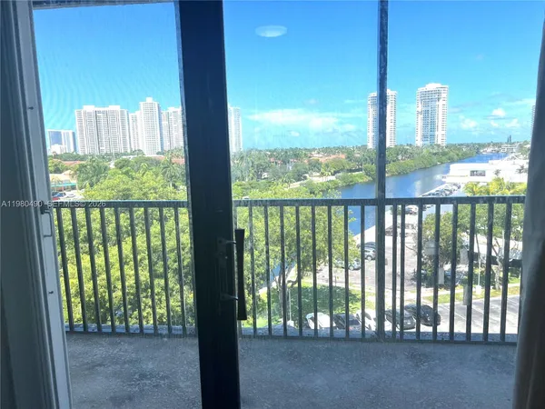 a view of a lake with a building in the background