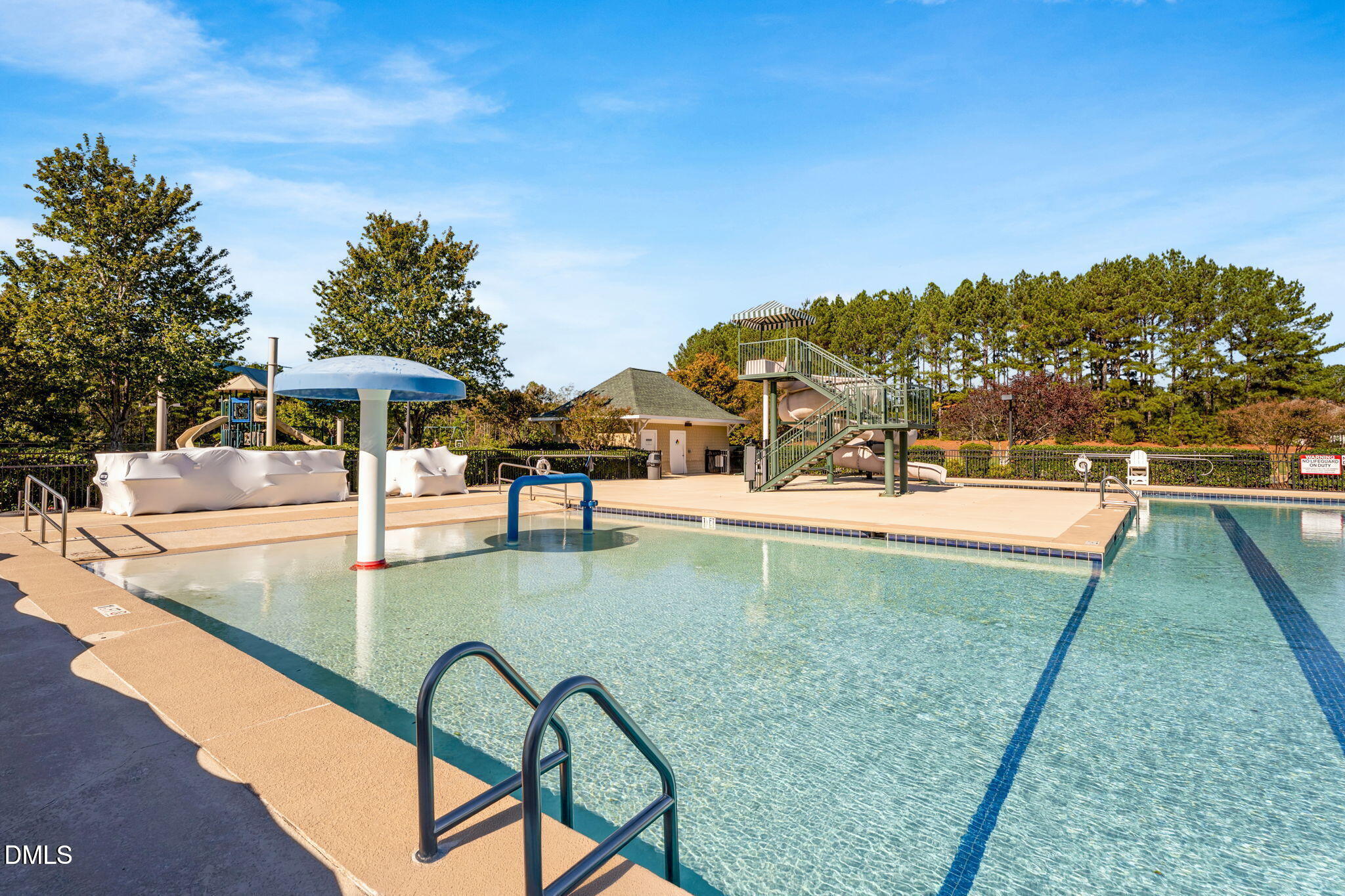 223 Colonial Ridge Drive Pittsboro, NC 27312 - Photo 43 of 47 a view of a swimming pool with an outdoor seating
