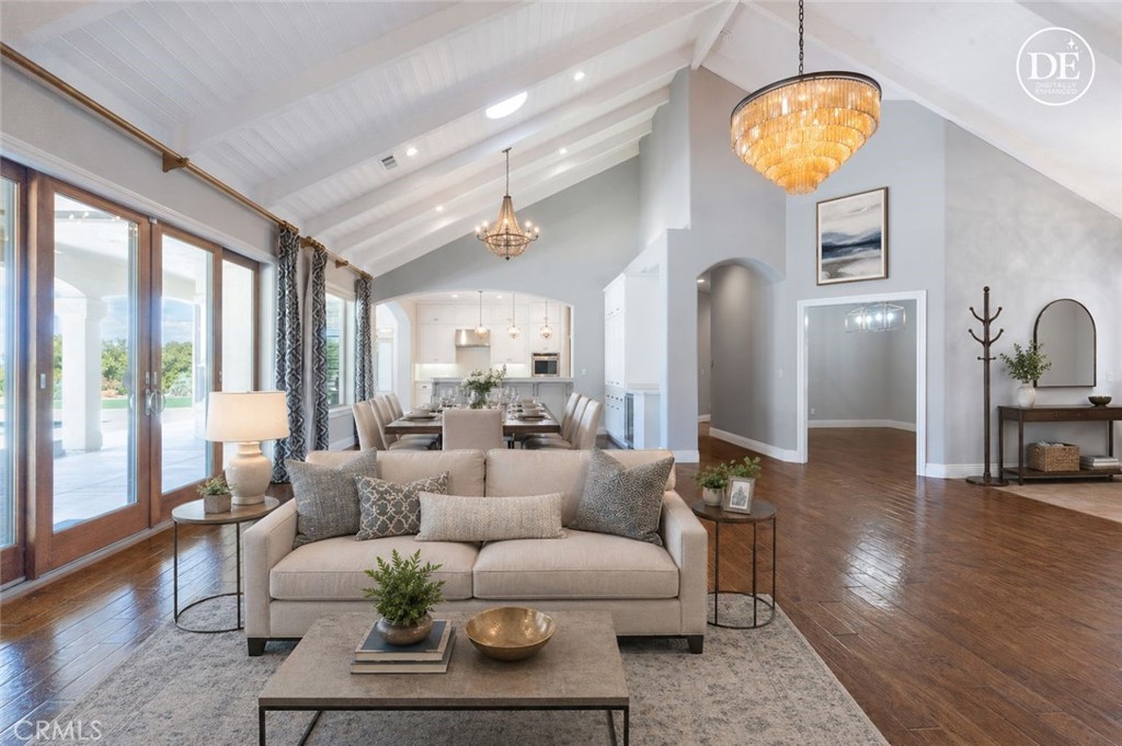 520 Stanton Street Arroyo Grande, CA 93420 - Photo 12 of 45 a living room with furniture and a chandelier
