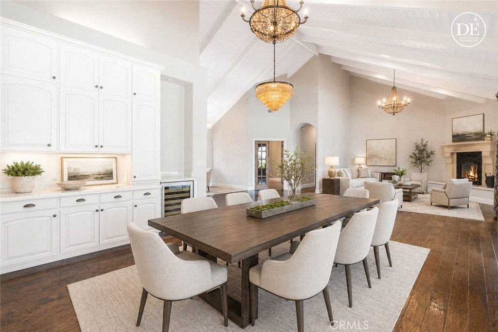 520 Stanton Street Arroyo Grande, CA 93420 - Photo 14 of 45 a view of a dining room with furniture and a chandelier