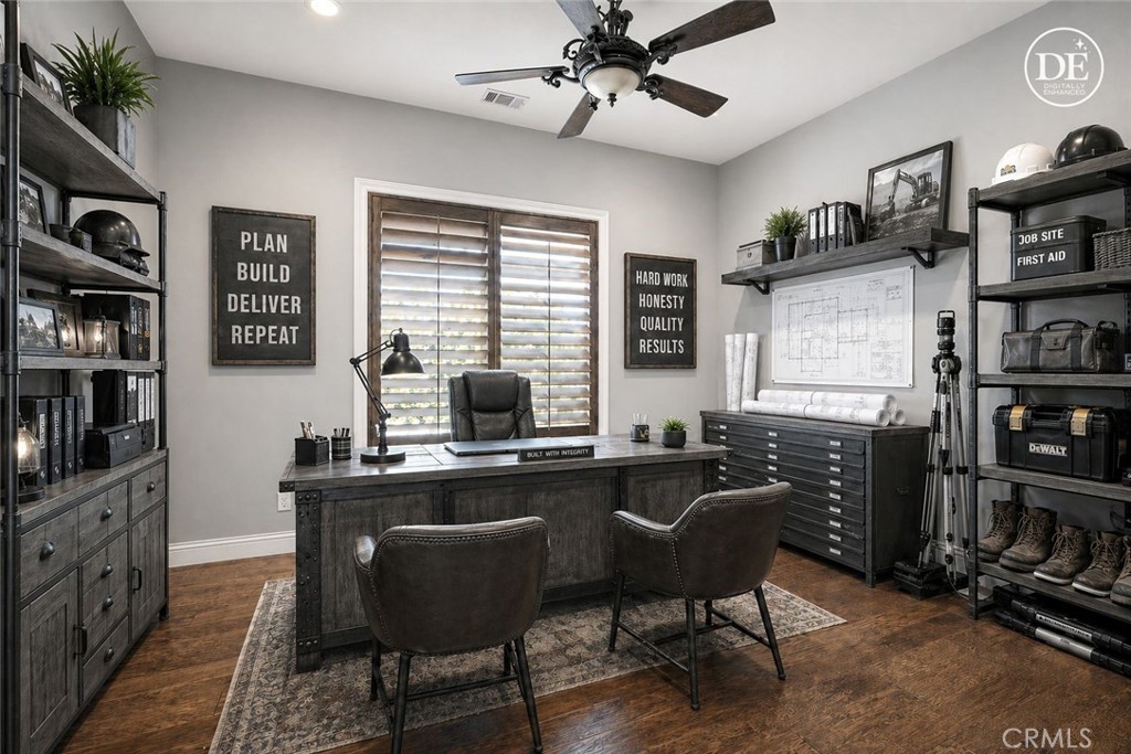 520 Stanton Street Arroyo Grande, CA 93420 - Photo 18 of 45 a view of a workspace with furniture and a bookshelf