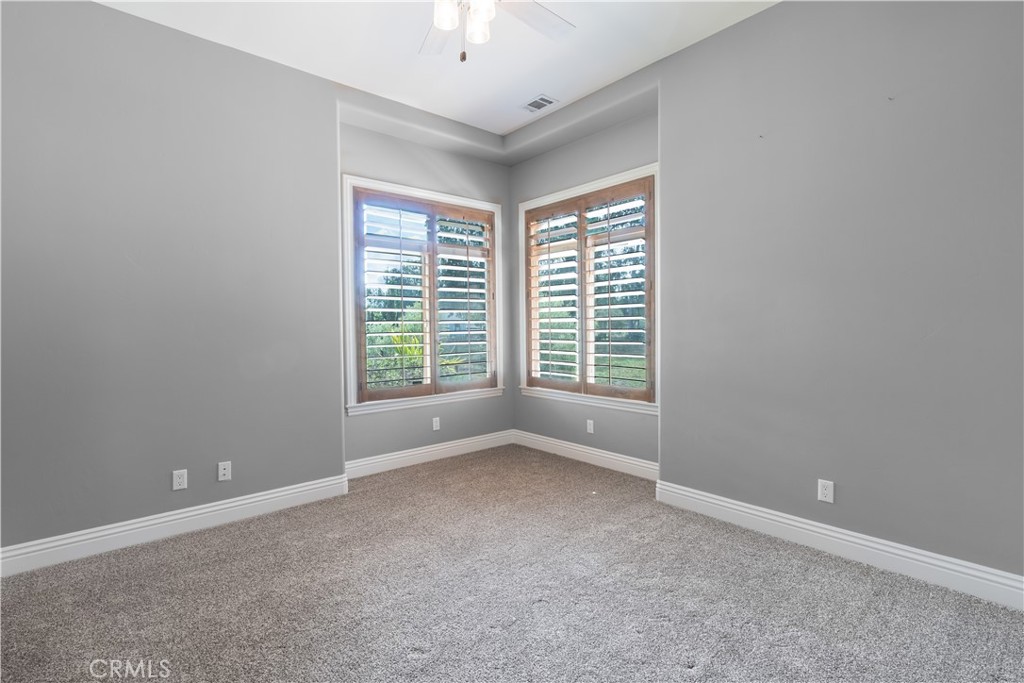 520 Stanton Street Arroyo Grande, CA 93420 - Photo 23 of 45 an empty room with windows