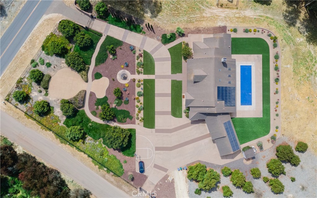520 Stanton Street Arroyo Grande, CA 93420 - Photo 4 of 45 an aerial view of a house with a garden