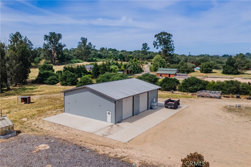 520 Stanton Street Arroyo Grande, CA 93420 - Photo 5 of 45 a view of a terrace with a garden and trees