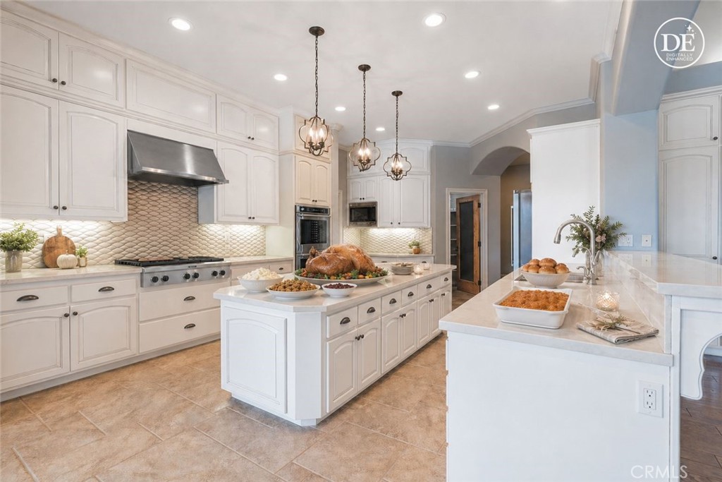 520 Stanton Street Arroyo Grande, CA 93420 - Photo 9 of 45 a kitchen with cabinets and stove