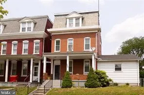 a front view of a house with balcony