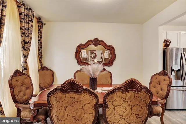 a room with furniture and a mirror