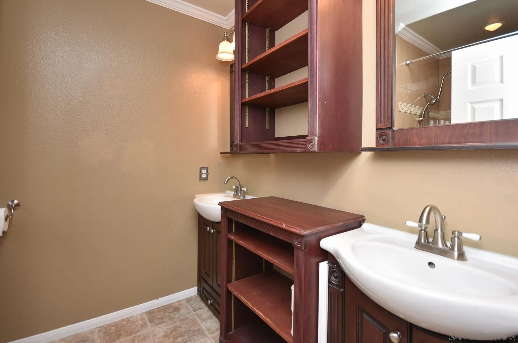 455 Mainsail Road Oceanside, CA 92054 - Photo 13 of 17 a bathroom with a sink and a mirror