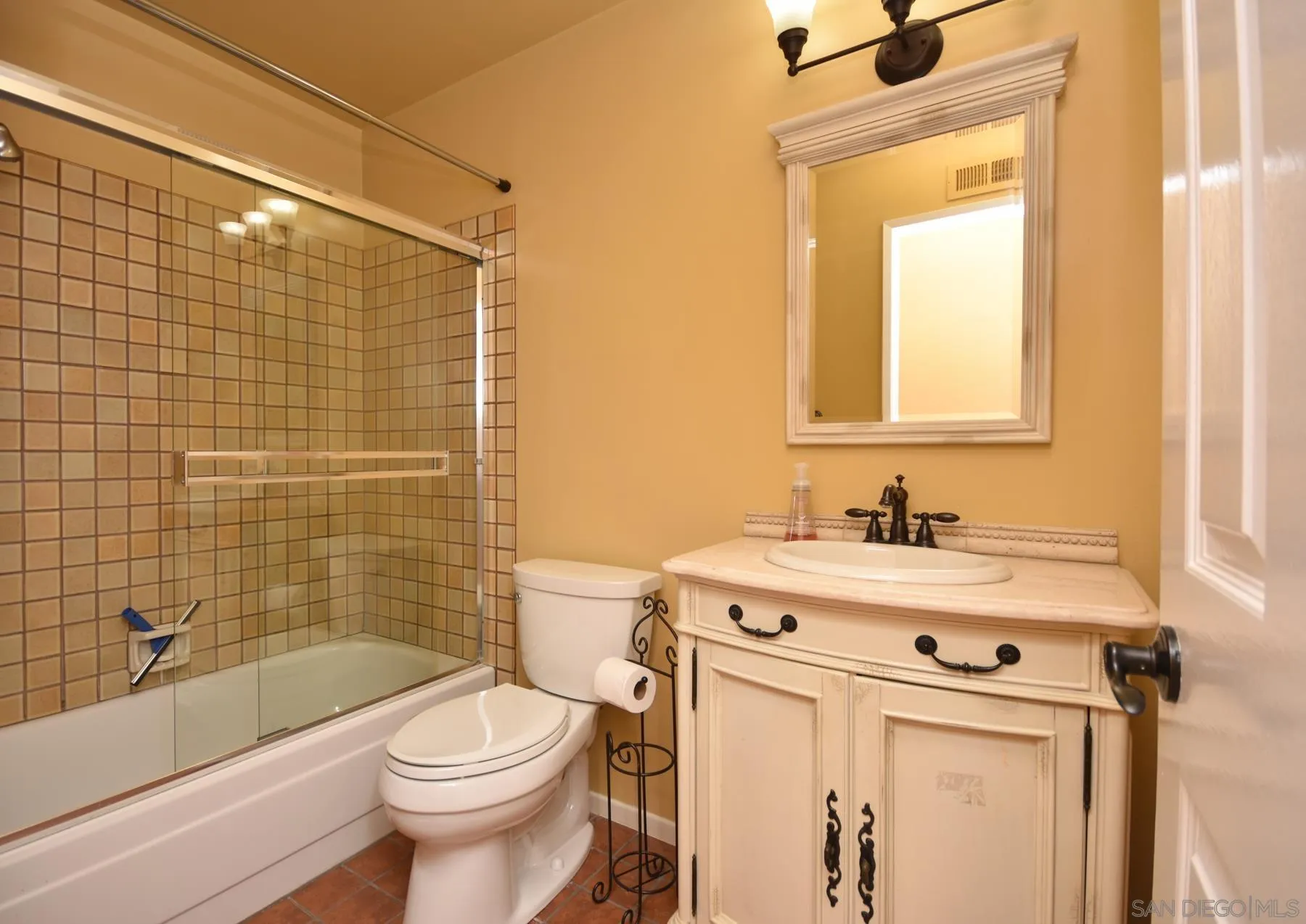 455 Mainsail Road Oceanside, CA 92054 - Photo 8 of 17 a bathroom with a sink a toilet and shower