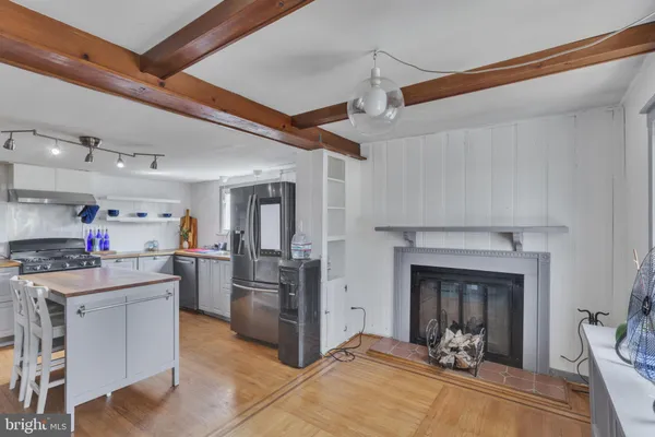 a view of a kitchen with cabinets