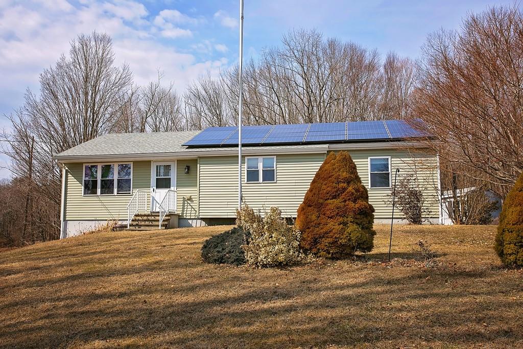 118 County Road Huntington, MA 01050 - Photo 1 of 32 a view of a house with a patio