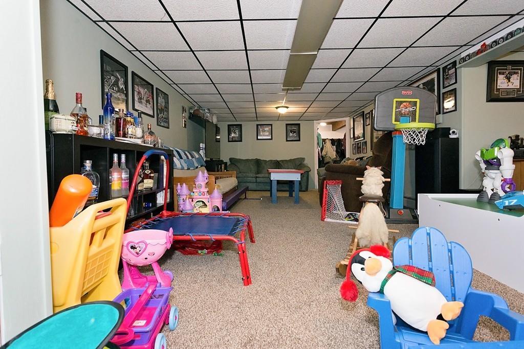 118 County Road Huntington, MA 01050 - Photo 26 of 32 a living room filled with furniture and toys