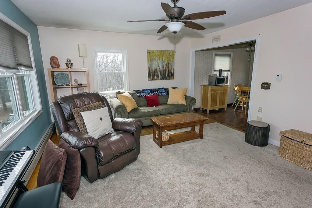 118 County Road Huntington, MA 01050 - Photo 5 of 32 a living room with furniture and a window