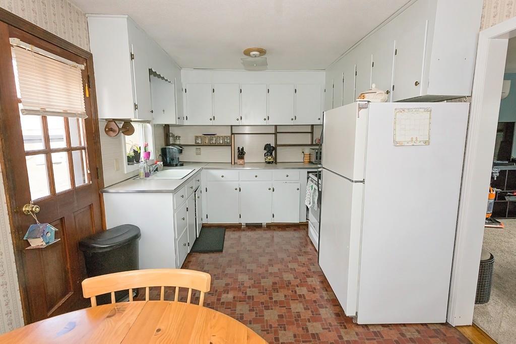 118 County Road Huntington, MA 01050 - Photo 10 of 32 a utility room with cabinets washer and dryer