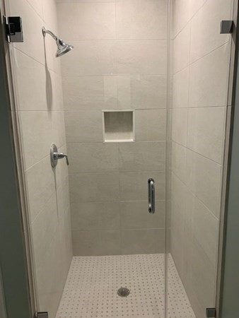 129 Centre Street Dover, MA 02030 - Photo 14 of 18 a bathroom with a shower