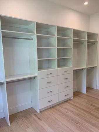 129 Centre Street Dover, MA 02030 - Photo 10 of 18 a view of an empty walk in closet