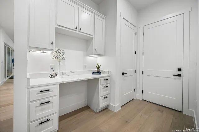 a view of cabinets a sink and dishwasher in a kitchen