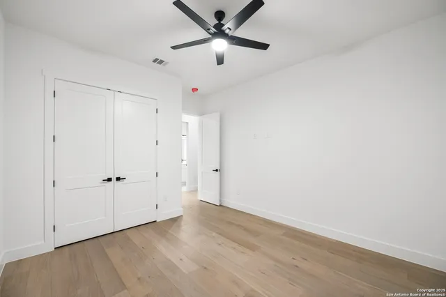 a bathroom with a double vanity sink double mirror and a bathtub