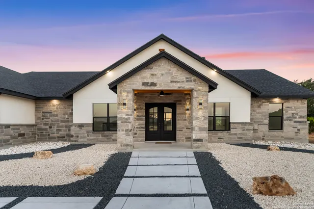 a view of a house with a patio