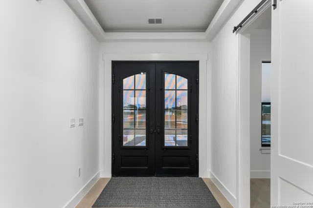 a view of entryway with a front door